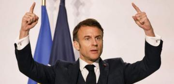 Defiant Macron says he won't resign, backs Barnier's survival 