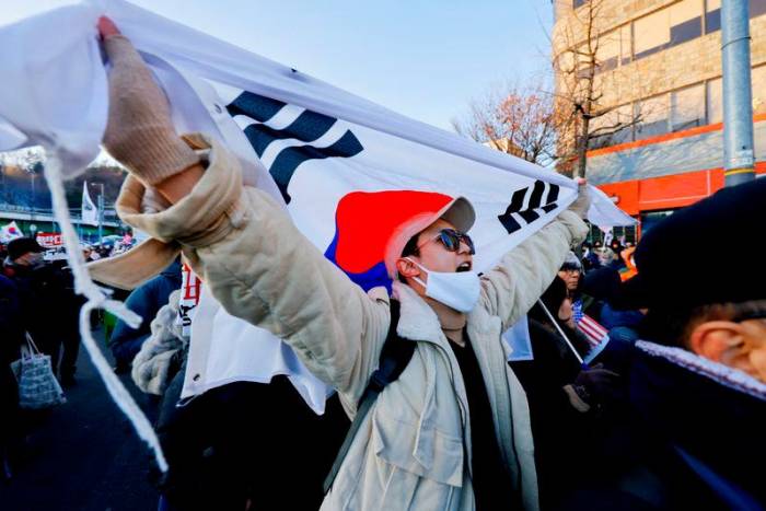South Korea's Yoon, facing unprecedented arrest over martial law, vows to 'fight until end' 