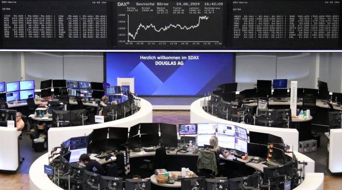 Asian stocks surge as dollar hits two-year high amid US rate concerns