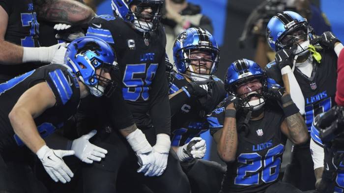 Lions clinch NFC North title with 31-9 victory over Vikings