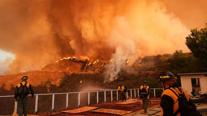 Firefighters face critical battle against Los Angeles wildfires, with dangerous winds expected