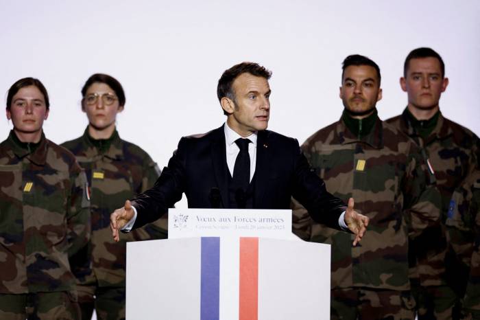 As Trump arrives, Macron implies NATO spending target is insufficient 