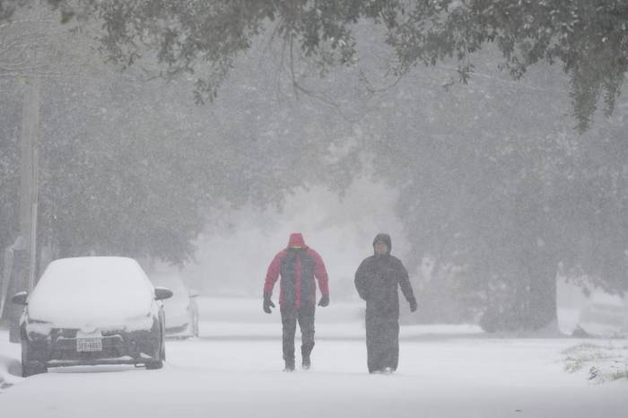Rare snowstorm sweeps through US south, leaving four dead