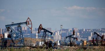 Oil prices climb on hopes of economic stimulus, increased fuel demand