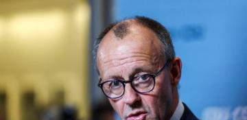 Germany's front-runner for chancellor won't commit to new NATO spending target 