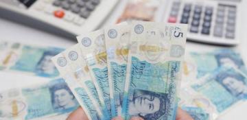 Pound hits nine-month low as UK borrowing costs soar