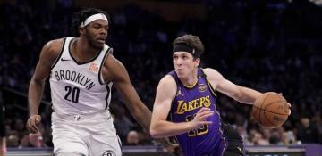 Austin Reaves scores career-high 38 points as Lakers hold off Nets 102-101
