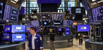 Global stocks reach record highs as Trump softens China stance