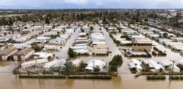 California wildfires could end as storm brings flash flood risk to fire-hit regions