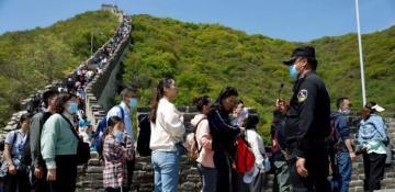 China hails surge in domestic tourism 
