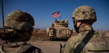 What drives US strategy to maintain troops in post-Assad Syria? 