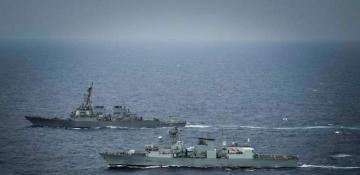 US and Canadian warships hold joint drills in South China Sea 