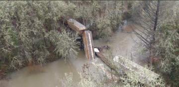 Freight train derails after bridge collapses into the Corvallis River  -VIDEO 