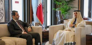 Syria's new leadership calls on the US to lift sanctions during a visit to Doha