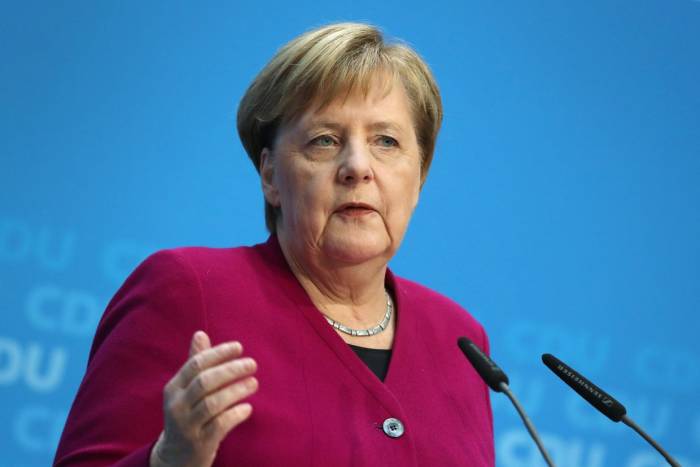 Merkel calls on parties to ease pre-election turmoil 