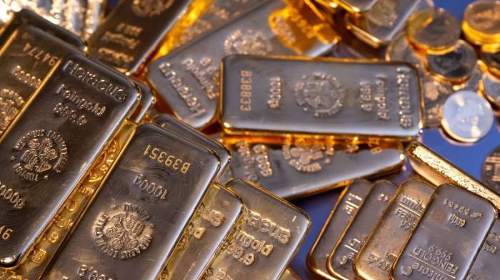 Gold prices near record high ahead of key US jobs report