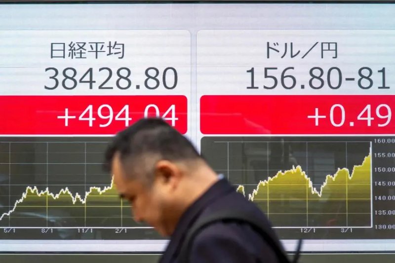 Tokyo stocks end higher on tech shares 