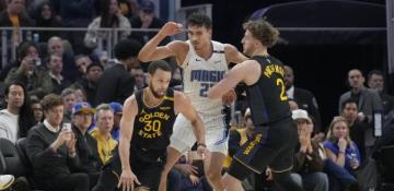 NBA: Curry, Wiggins lead Warriors to 104-99 victory over Magic