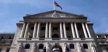 Bank of England cuts interest rates, lowers UK growth forecast