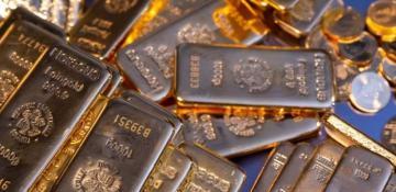 Gold prices near record high ahead of key US jobs report