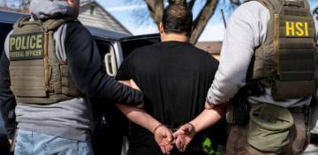 Hundreds of migrants arrested in UK crackdown on illegal working