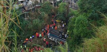 At least 51 dead in Guatemala after bus plunges off bridge