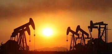 Oil holds gains as Russian output falls below OPEC+