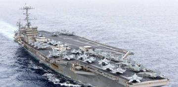US aircraft carrier collides with merchant ship in Mediterranean Sea