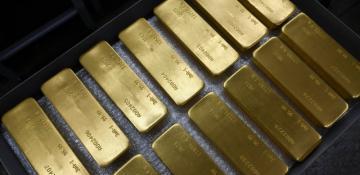 Gold hits near-record levels as ETF holdings surge, dollar eases