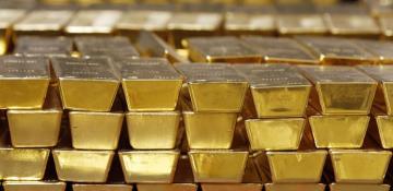 Gold holds steady amid profit-taking, supported by US data, trade concerns