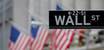 Wall Street ends mixed as Coca-Cola gains and Tesla drops 