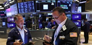 Futures muted, Trump tariff remarks, gold near record high - what's moving markets 