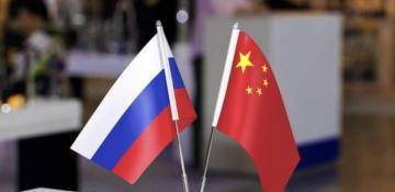 Chinese and Russian FMs hold talks on strengthening ties 
