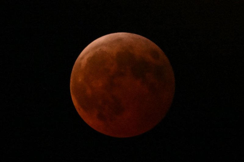 News about -  In photos:  Blood moon lights up the sky in stunning lunar eclipse display