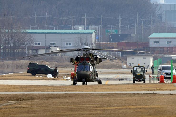 South Korean military drone collides with helicopter on ground at airfield