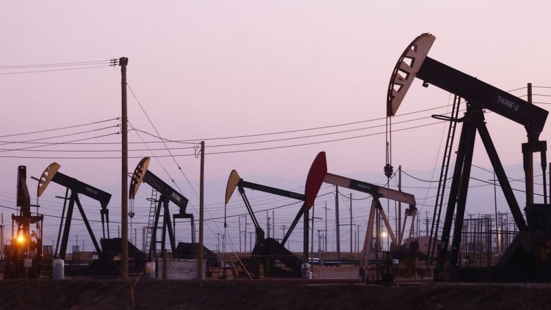Oil prices edge higher as US crude stockpiles shrink