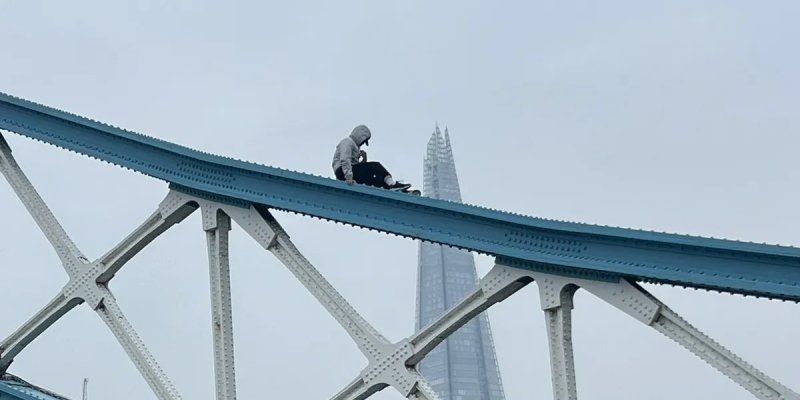 London's Tower Bridge temporarily closed after man climbs railings