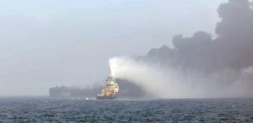 One crew member still missing as oil tanker on fire after collision in North Sea