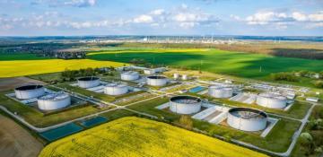 Oil prices edge higher on US crude stockpile decline