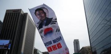 Rival rallies break out in South Korea before president's impeachment ruling 
