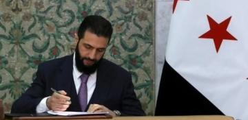 Syria's leader signs constitutional declaration, calls it 'new history' 