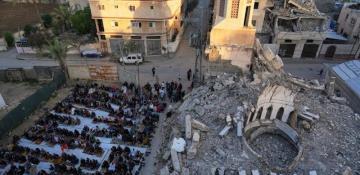 'Eid of sadness': Palestinians in Gaza observe the Muslim holiday with limited food and no end to the war