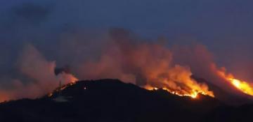 Wildfires in western Japan damage homes, forcing evacuations in two areas 