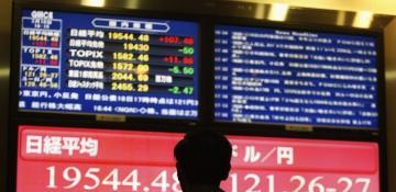 Asia stocks rise after Fed hold; China hit by tech profit-taking 