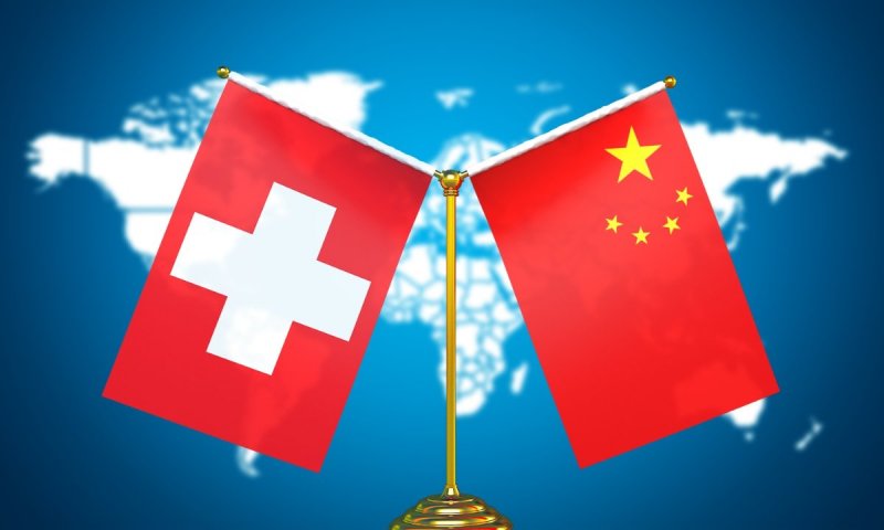 Chinese and Swiss FMs discuss supporting multilateralism and free trade 
