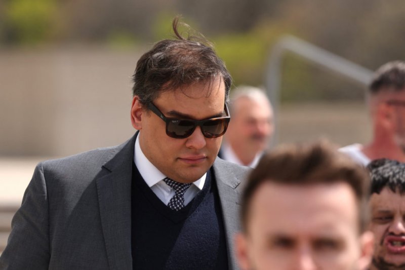 Former US congressman George Santos jailed for seven years