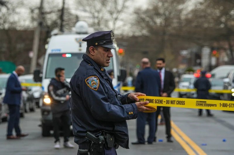 Police say officers shot a man wielding a meat cleaver after four children were stabbed in Brooklyn