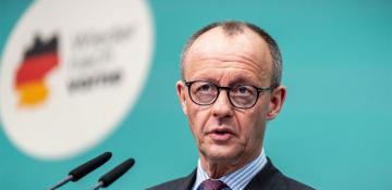 Germany's Merz strikes deal to form new government with rival party 