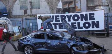Activists destroy Tesla in London protest against Elon Musk -  VIDEO 