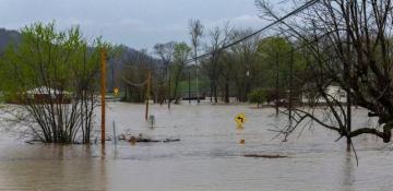 At least 16 dead in flooding and tornadoes as storms slash US South and Midwest 